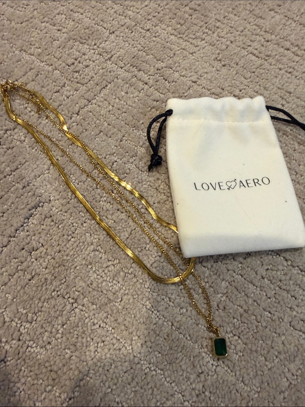Love Aero waterproof necklace.  Gold-Tone Layered Necklace with Green Pendant
